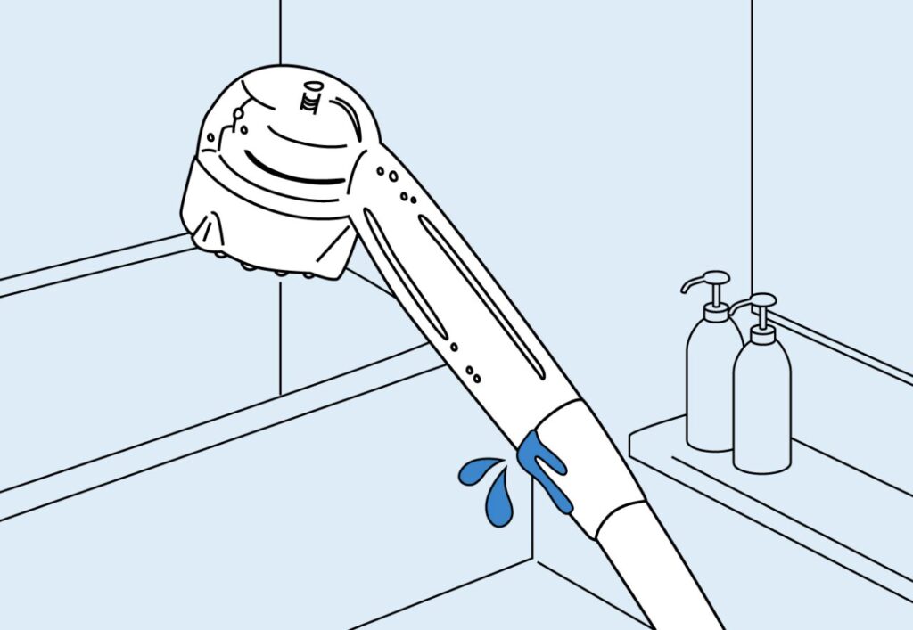 シャワーヘッドの付け根より水漏れしている様子