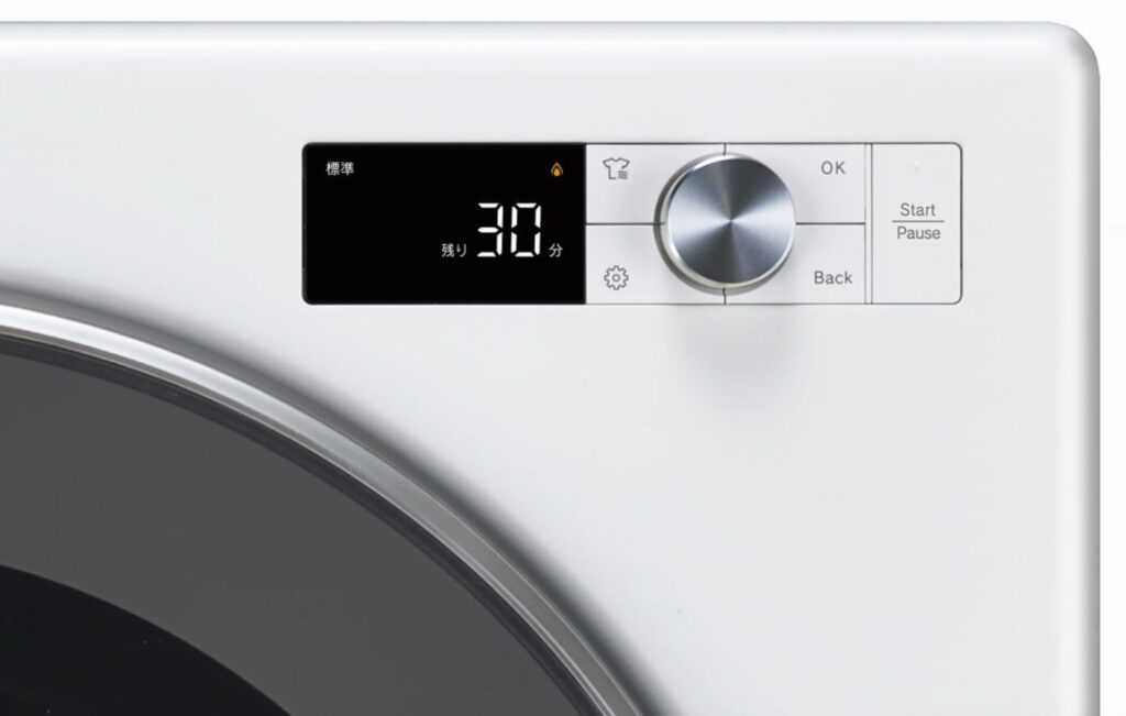 ガス衣類乾燥機の操作パネルに「標準」「残り30分」と表示されている様子。シルバーのダイヤルとスタートボタンが並ぶ正面デザイン。