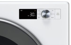 ガス衣類乾燥機の操作パネルに「標準」「残り30分」と表示されている様子。シルバーのダイヤルとスタートボタンが並ぶ正面デザイン。